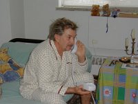 P2100004  Grandpa Kovacs is on the phone. Long distance from Coudersport.